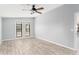 Well lit bedroom features neutral walls and laminate flooring, enhancing the home's aesthetic appeal at 2521 Coral Way, Lakeland, FL 33801