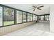 Sunroom featuring large windows that provide plenty of light and outdoor views at 2521 Coral Way, Lakeland, FL 33801