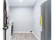 Utility room with HVAC unit and water heater; also space for storage at 2521 Coral Way, Lakeland, FL 33801