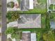 Birds eye view of a house with green hedge privacy, complemented by a lengthy driveway at 2616 Fairmount Ave, Lakeland, FL 33803