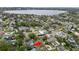 Aerial view of home in mature neighborhood that is close to a large body of water with a red arrow at 2616 Fairmount Ave, Lakeland, FL 33803