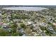 Overhead shot showcasing the neighborhood near a lake, with lush landscaping at 2616 Fairmount Ave, Lakeland, FL 33803