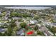 Aerial view of home in mature neighborhood that is close to a large body of water with a red arrow at 2616 Fairmount Ave, Lakeland, FL 33803