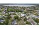 An aerial view captures a residential area near a large lake, highlighting the community at 2616 Fairmount Ave, Lakeland, FL 33803