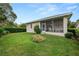 Charming back porch that overlooks a spacious backyard that is great for entertaining and relaxing at 2616 Fairmount Ave, Lakeland, FL 33803