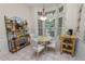 Bright breakfast nook with natural light with small decorative table and wall art at 2616 Fairmount Ave, Lakeland, FL 33803