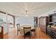 Cozy dining room featuring a wood table, chairs, and tiled flooring, perfect for gatherings at 2714 Golfview St, Lakeland, FL 33801