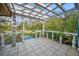 Outdoor patio with a pergola and tiled flooring, offering a relaxing space for outdoor enjoyment at 2714 Golfview St, Lakeland, FL 33801