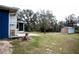 View of the spacious backyard featuring a small storage shed at 304 Olmo Ct, Winter Haven, FL 33880