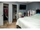 Bedroom showcases a double closet for ample storage space at 304 Olmo Ct, Winter Haven, FL 33880