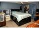 Bedroom featuring a bed, ceiling fan and other home decor at 304 Olmo Ct, Winter Haven, FL 33880