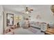 Brightly decorated Bedroom featuring crib, chair, mirror and rainbow wall decor at 3207 S Polk Ave, Lakeland, FL 33803