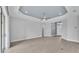 Bright living room featuring tile floors, ceiling fan, recessed lighting, and a light blue accent on the trey ceiling at 3224 Pearly Dr, Lakeland, FL 33812