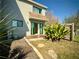 View of back of home featuring a private patio area and lush landscaping, perfect for outdoor living at 3350 Kilmer Dr, Lakeland, FL 33803