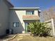 View of back of home, showcasing a well-maintained exterior and a private outdoor space at 3350 Kilmer Dr, Lakeland, FL 33803