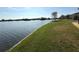 This property offers breathtaking lake views and waterside access from the lush, green lawn at 3350 Kilmer Dr, Lakeland, FL 33803