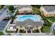 Aerial view of a community pool, showing the pool house and lounge area at 4010 Winding Vine Dr # 4010, Lakeland, FL 33812