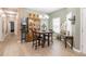 Cozy dining area featuring a wooden table, hutch and laminate flooring at 4010 Winding Vine Dr # 4010, Lakeland, FL 33812