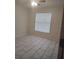 Bedroom featuring neutral walls, ceiling fan, and a bright window at 406 Fox Lake Dr, Lakeland, FL 33809