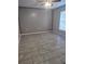 Bedroom featuring neutral walls, ceiling fan, and a bright window at 406 Fox Lake Dr, Lakeland, FL 33809