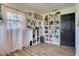 This bright bedroom features wood flooring, a window, and built-in shelving at 507 8Th Se St, Fort Meade, FL 33841