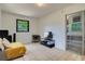 This living room features tile flooring, natural light, a TV area, and couch at 507 8Th Se St, Fort Meade, FL 33841