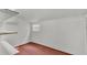 Clean basement with white walls, shelves, and a small window at 511 Mcrorie St, Lakeland, FL 33803