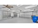 Clean garage with metal storage cabinets and epoxy floor at 511 Mcrorie St, Lakeland, FL 33803