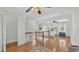 Bright and airy main bedroom with an open floorplan, natural light, and wooden floors throughout at 511 Mcrorie St, Lakeland, FL 33803