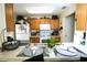 Well-lit kitchen featuring modern appliances, ample counter space, and a breakfast bar at 5377 Quarry Rock Rd, Lakeland, FL 33809