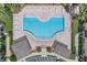 Overhead view of a resort style pool, deck chairs and landscaping at 5377 Quarry Rock Rd, Lakeland, FL 33809