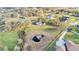 Aerial view showing home near a pond with green space and surrounding neighborhood at 5435 Myrtle Hill W Dr, Lakeland, FL 33811