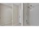 Bathroom shows a shower stall with white tile and a separate toilet area at 5435 Myrtle Hill W Dr, Lakeland, FL 33811