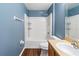 Standard bathroom with tub/shower combo, toilet, and single sink vanity at 560 Hatchwood Dr, Haines City, FL 33844