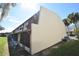 Exterior view of townhome showing extended facade and lawn area at 6043 Topher Trl # 6043, Mulberry, FL 33860