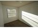 Well-lit carpeted bedroom with a window offering lots of natural light at 6055 Topher Trl # 6055, Mulberry, FL 33860