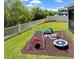 Well-maintained backyard with playground equipment and partial fence at 6249 Great Bear Dr, Lakeland, FL 33805