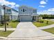 Beautiful two-story home with a two-car garage, landscaped front yard, and inviting entryway at 6249 Great Bear Dr, Lakeland, FL 33805