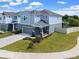 Charming two-story home with manicured lawn and stylish exterior, located in a beautiful neighborhood at 6249 Great Bear Dr, Lakeland, FL 33805