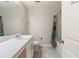 Clean bathroom featuring a vanity sink, toilet, and shower/tub combination at 645 Sarner Pass Way, Winter Haven, FL 33881