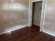 Bedroom with wood floors and a closet at 6528 Shepherd Oaks Pass, Lakeland, FL 33811