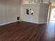 Open living room with wood floors and lots of space at 6528 Shepherd Oaks Pass, Lakeland, FL 33811