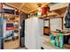 Interior shot showcasing refrigerator and other storage units within shed at 6792 Brentwood Ne Dr, Winter Haven, FL 33881