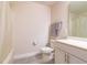 Neutral bathroom features a shower/tub combination, and a vanity with storage at 685 Meadow Pointe Dr, Haines City, FL 33844