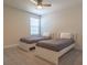 This simple bedroom features carpet, neutral walls, and two twin beds with room to roam at 685 Meadow Pointe Dr, Haines City, FL 33844