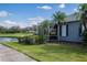 Beautiful single-story home with a screened patio, lush landscaping and lake view at 7104 Lake Eaglebrooke Way, Lakeland, FL 33813