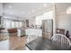 Well-equipped kitchen with granite counters, stainless appliances, and a view of the Gathering room at 7104 Lake Eaglebrooke Way, Lakeland, FL 33813