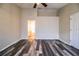 Spacious primary bedroom with modern flooring and ensuite bathroom at 7997 Kaitlin Cir, Lakeland, FL 33810