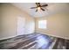 Bedroom featuring modern floors, ceiling fan, and lots of natural light at 7997 Kaitlin Cir, Lakeland, FL 33810