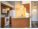 An inviting view of the kitchen featuring modern appliances and lots of counterspace at 7997 Kaitlin Cir, Lakeland, FL 33810